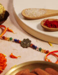 Om Golden Charm 7 Chakra 4 MM Beads Rakhi