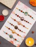 Crystal With OM Round Charm Rakhi Set